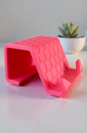 Support smartphone design alvéolé 3D : Un accessoire stylé et pratique pour toutes vos surfaces