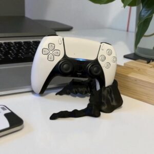 Support manette PS5 bloc de roche 3D : La manette suspendue dans un écrin minéral unique