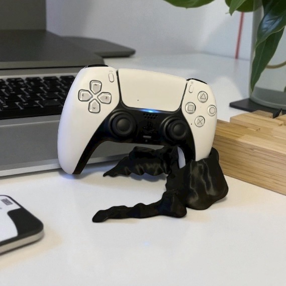 Support manette PS5 bloc de roche 3D : La manette suspendue dans un écrin minéral unique
