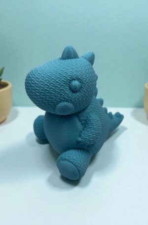 Dino bleu peluche 3D : La figurine douce et originale pour une déco ludique et réconfortante